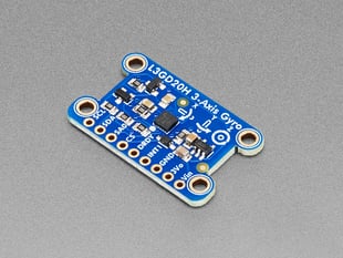 Angled shot of blue, rectangle-shaped gyroscope breakout board with four mounting holes.