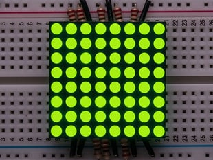 Small, 8x8 yellow-green LED Matrix on breadboard.
