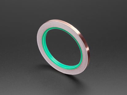 Copper Foil Tape with Conductive Adhesive - 6mm x 15 meter roll - Angled Shot of the Copper Foil Tape with Conductive Adhesive - 6mm x 15 meter roll.