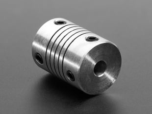 Angled close-up of aluminum shaft coupler.