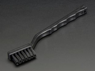 Black toothbrush-looking brush