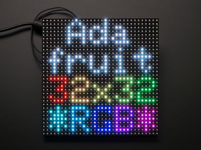 32x32 RGB LED Matrix Panel - 6mm pitch - Assembled and powered on 32x32 RGB LED Matrix Panel - 6mm pitch. The matrix lights up "Adafruit 32x32 *RGB*"