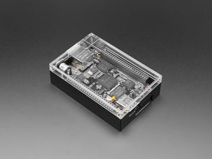 Angled shot of black microcontroller in enclosure.