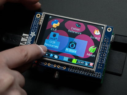 Adafruit PiTFT - 320x240 2.8" TFT+Touchscreen for Raspberry Pi - 320x240 2.8 inch TFT and Touchscreen installed on Raspberry Pi with desktop showing