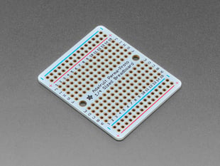 Angled Shot of the Adafruit Perma-Proto Quarter-sized Breadboard PCB - Single.