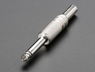 1/4" mono audio plug.