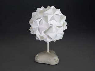 Angled shot of not powered on Origami LED Lamp Shade Kit.