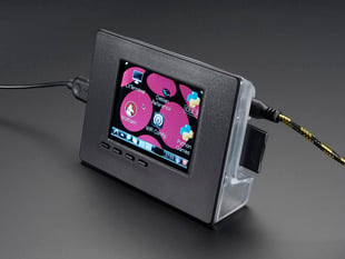 Angled shot of assembled PiTFT enclosure with a desktop on the TFT display.