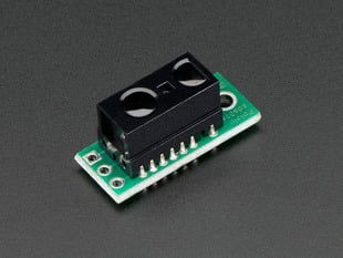 Angled shot of a Sharp GP2Y0D810Z0F Digital Distance Sensor with Pololu Carrier. 