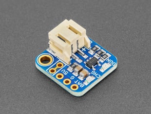 Angled Shot of the Adafruit LiIon/LiPoly Backpack Add-On for Pro Trinket/ItsyBitsy.