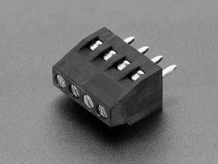 Angled shot of black 4-pin 2.54mm terminal block.