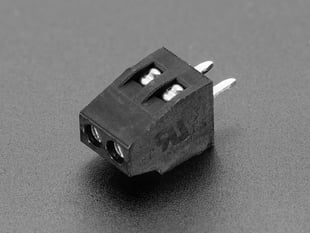 Angled shot of black 2-pin 2.54mm terminal block.