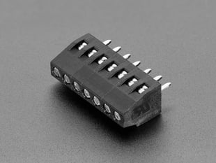 Angled shot of black 7-pin 2.54mm terminal block.