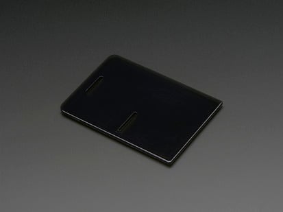 Raspberry Pi Model B+ / Pi 2 / Pi 3 Case Lid - Smoke Gray - Angled shot of Raspberry Pi Model B+ / Pi 2 / Pi 3 Case Lid - Smoke Gray.