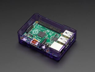 Assembled purple acrylic Raspberry Pi case with no lid.