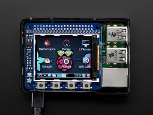 Top down view of a Adafruit PiTFT 2.2" HAT Mini Kit with desktop image on the display. 