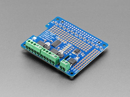 Adafruit DC & Stepper Motor HAT for Raspberry Pi - Mini Kit - Angled shot of Adafruit DC & Stepper Motor HAT.