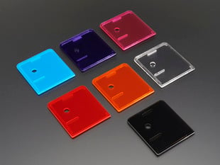 Angled shot of group of variously colored lid covers for Raspberry Pi Model A+ Cases.