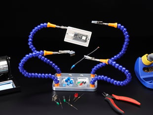 Demo Shot of the Super Fancy Third Hand Kit from Hobby Creek with Four Arms holding up various components.