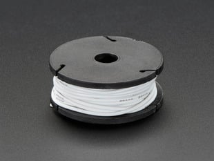 White stranded-core wire on a reel.
