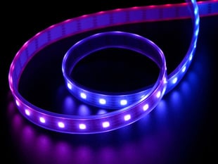 Angled shot of LED strip emitting purple and blue lights.