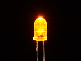 Single LED lit up bright yellow