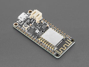 Angled shot of black, rectangular WiFi development board.