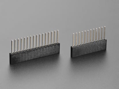 Stacking Headers for Feather - 12-pin and 16-pin female headers - Angled shot of a Stacking Headers for Feather - 12-pin and 16-pin female headers. 