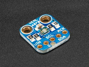 Blue, square-shaped UV index sensor breakout board.