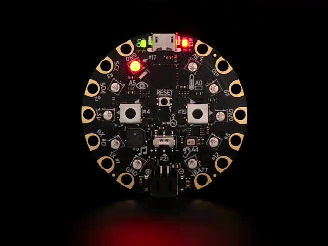 Circuit Playground Classic - Video of a round microcontroller with lit up LEDs.