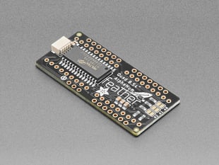 Angled shot of a Adafruit 14-Segment Alphanumeric LED FeatherWing. 