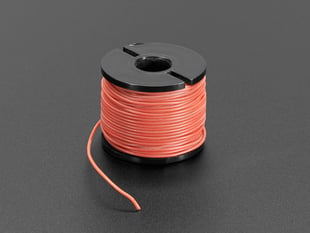 A spool of light red AWG wire.