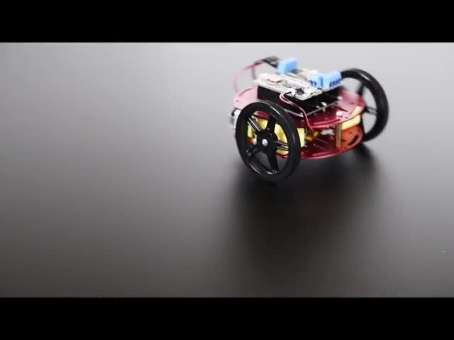 Mini Round Robot Chassis Kit - 2WD with DC Motors - Round two-wheeled robot turning around a few times and then driving off.