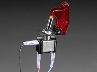 Demo Shot of the Illuminated Toggle Switch with Cover - Red