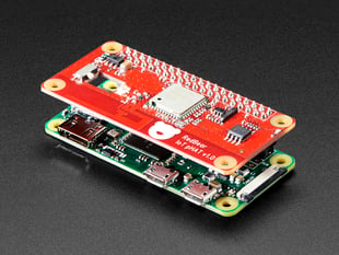 Angled shot of a Red Bear IoT pHAT for Raspberry Pi - WiFi + BTLE stacked on a Pi Zero. 