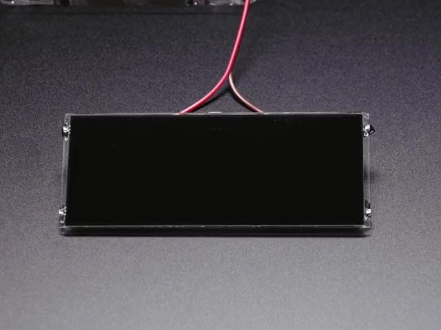 Large Liquid Crystal Light Valve - Controllable Shutter Glass - Large Liquid Crystal Light Valve - Controllable Shutter Glass turning on and off, showing and hiding a robot pin.