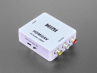 Angled shot of light pink, square HDMI to AV signal converter.