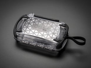 Waterproof enclosure for electronics with a lanyard string.