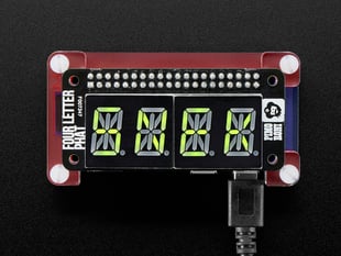 Top view of a Pimoroni Four Letter pHAT for Raspberry Pi Zero stacked on a Pi Zero. Display read "SNEK".