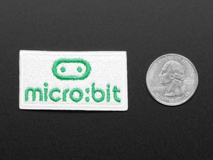 Rectangular shaped embroidered badge with the micro:bit logo in green over a white background