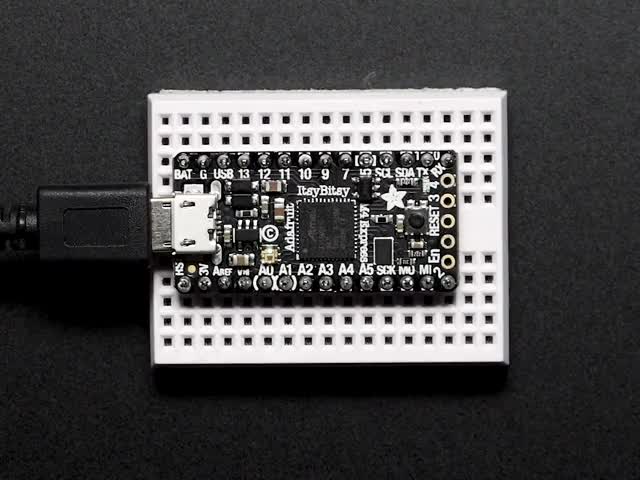 Adafruit ItsyBitsy M4 Express featuring ATSAMD51 - Adafruit ItsyBitsy M4 Express featuring ATSAMD51 connected to a small breadboard. 