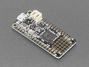 Angled shot of a Adafruit Feather M4 Express. 