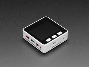 Angled shot of square-shaped microcontroller with display.