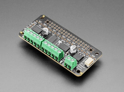 Adafruit DC & Stepper Motor Bonnet for Raspberry Pi - STEMMA QT / Qwiic - STEMMA QT / Qwiic - Angled Shot of the Adafruit DC & Stepper Motor Bonnet for Raspberry Pi.