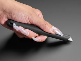 Hand holding Craft Knife with retractable Ceramic Blade