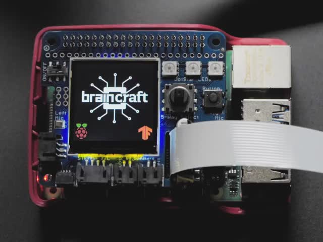 Adafruit BrainCraft HAT - Machine Learning for Raspberry Pi 4 - Video of a white hand hovering a coffe mug over a Adafruit BrainCraft HAT thats connected to a Raspberry Pi 4. Display detects that its a coffee mug. 