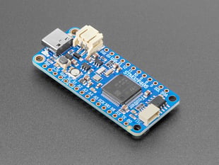 Angled shot of a blue rectangular microcontroller.
