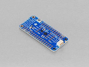 Angled shot of blue, rectangle-shaped, 9-DoF IMU.
