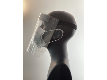 Protective Face Shields - Pack of 4 - Side profile of the face shield on a mannequin head. Shield starts at the forehead and ends below the chin