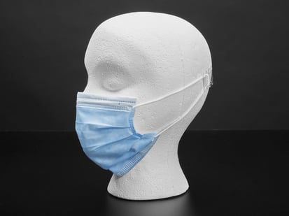 Standard Adult Disposable Masks - Blue Surgical-Style - 50 pk - Blue disposable surgical style mask shown on a mannequin head
